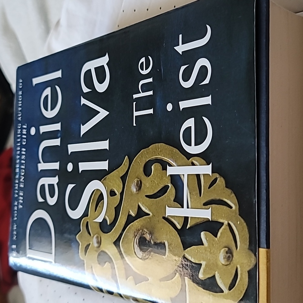 the Heist is a 2014 spy novel by Daniel Silva.Hardcover Edition